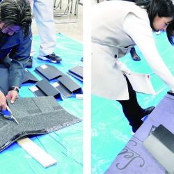 「オークリッジスーパー」の実地研修。ハサミで裁断できるのが特徴だ。女性社員も研修を受けた。