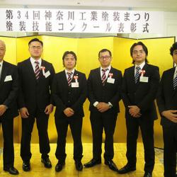 ㊧辻社長と技能実習生